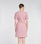 Tweed dress with jewellery buttons