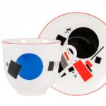 CUP WITH SAUCER LILY OF THE VALLEY * KALEIDOSCOPE WITH BLUE AND BLACK DISC